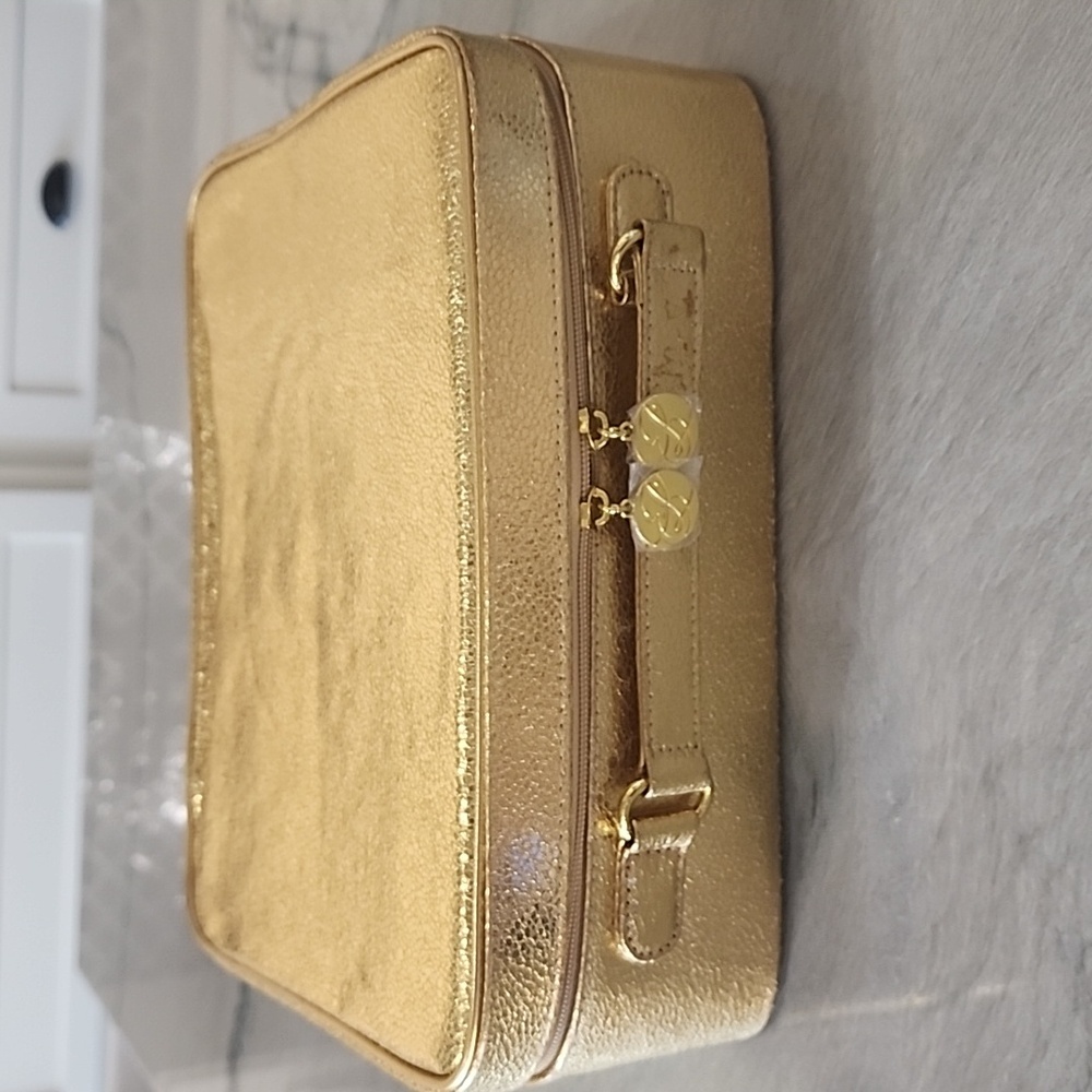 NWOT Estee Lauder Gold Travel Case